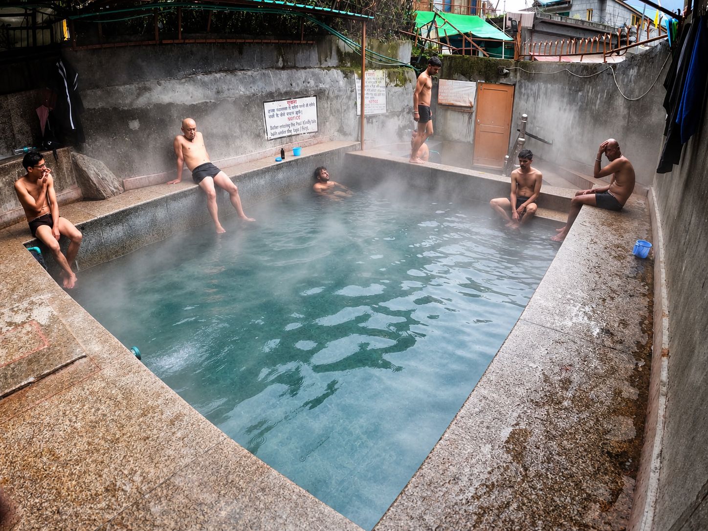Steaming natural hot spring pool in Vashisht village, Manali